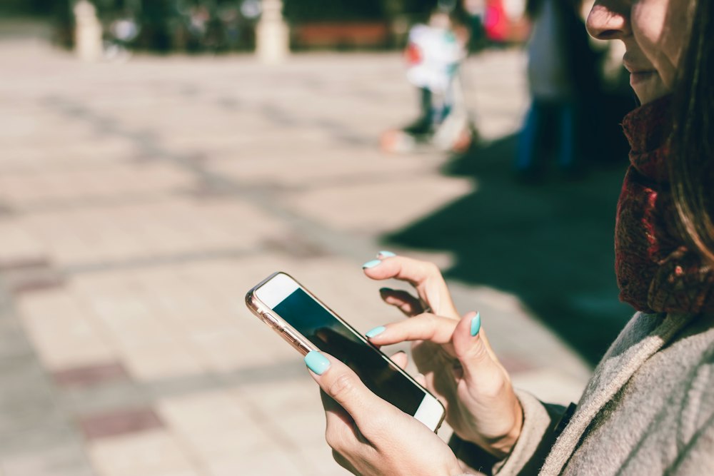 Woman scrolling on her phone