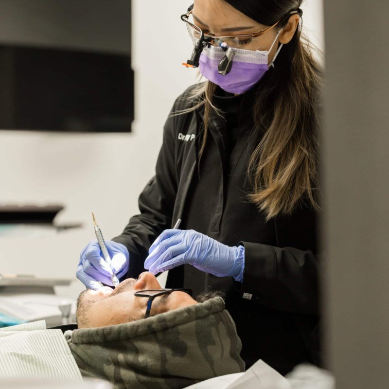 Dentist at work with a patient