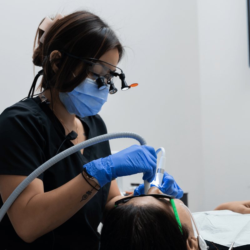 Dental hygienist at work